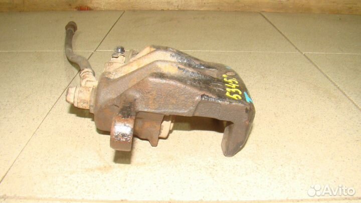 Суппорт задний левый Hyundai Tucson 1 (JM)