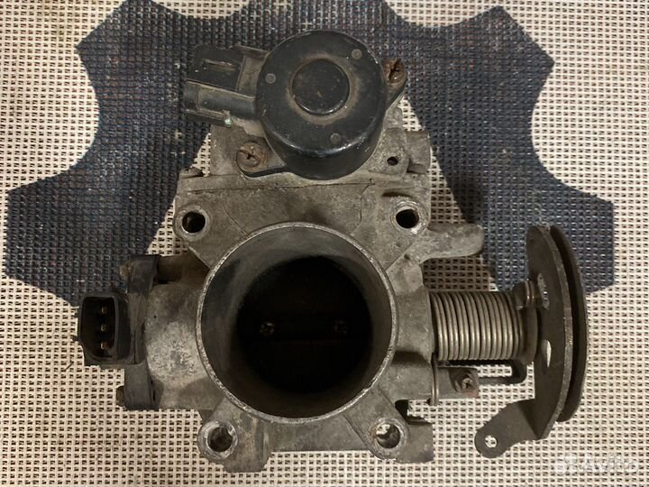 Дроссельная заслонка Nissan 161197J600