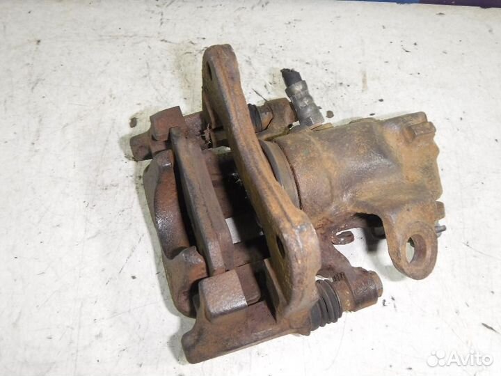 Суппорт задний правый VW Scirocco II