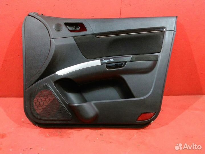 Обшивка передней правой двери Джили Эмгранд