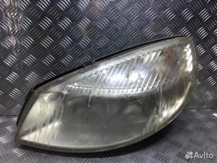 Фара левая Renault Scenic 15810300li F4R770