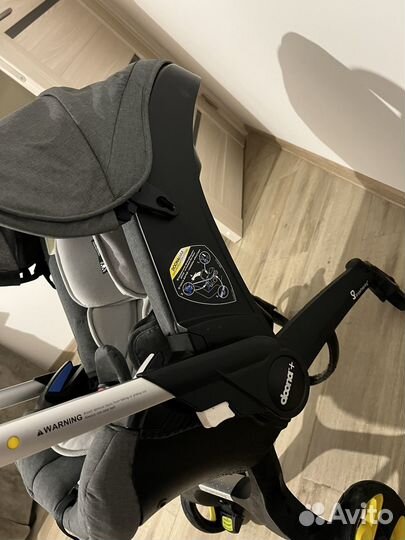 Коляска автокресло doona с базой isofix