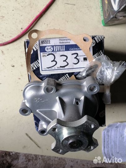 1334052 Водяной насос (помпа) opel Astra