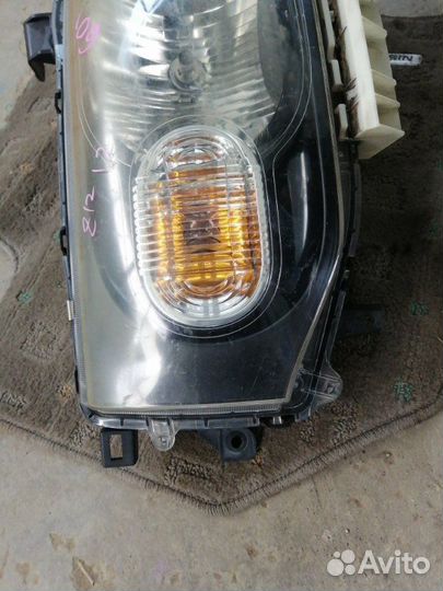 Фара передняя левая Nissan Cube Z12