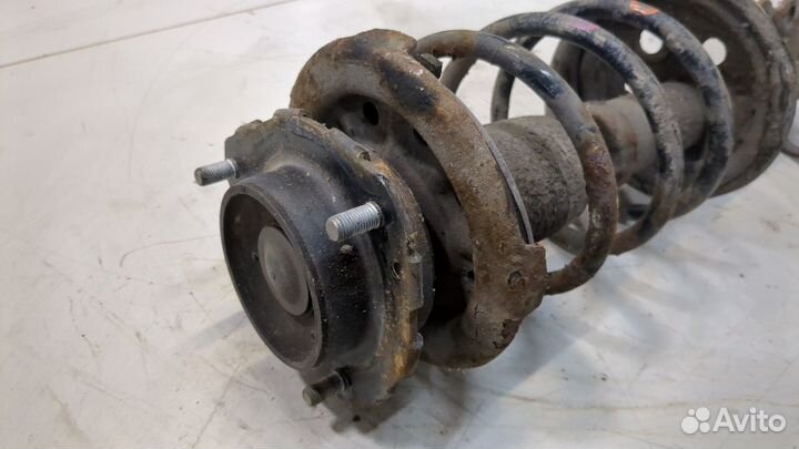 Амортизатор подвески левый передний Toyota Avensis 1