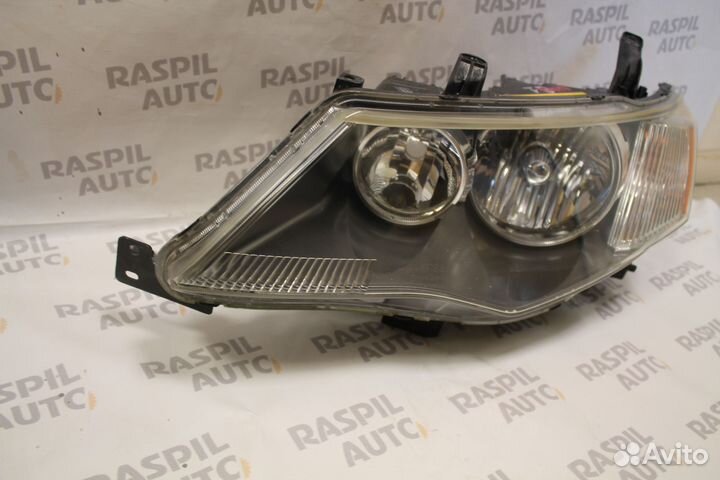 Фара левая Mitsubishi Outlander XL