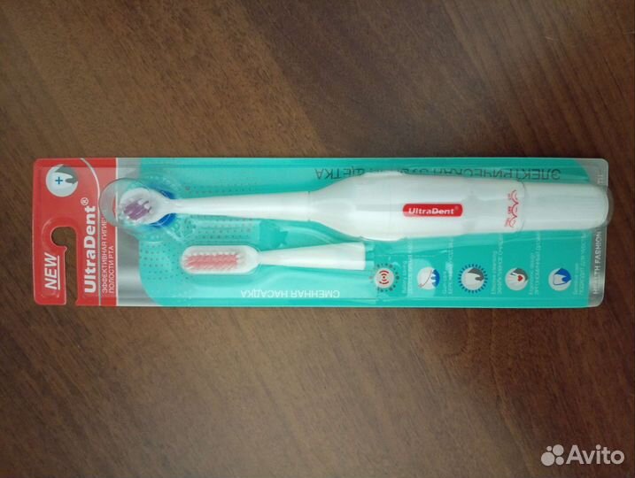 Электрическая зубная щетка Новая
