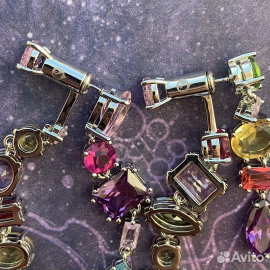 Swarovski разные серьги