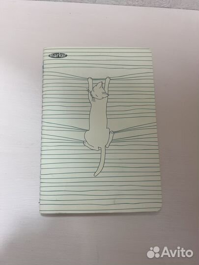 Тетрадь новая в клетку