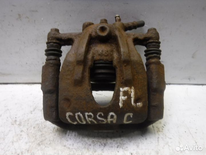 Суппорт передний левый Opel Corsa C 2000-2006