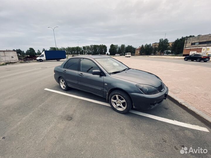 Машина mitsubishi lancer 9