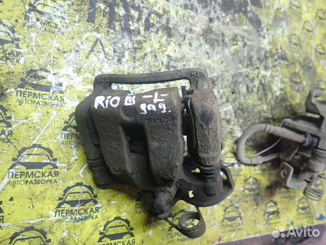 Суппорт тормозной задний левый Kia RIO 2011-2017