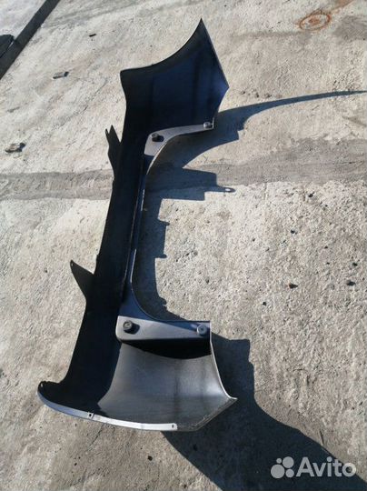 Бампер задний Toyota Ractis NCP100