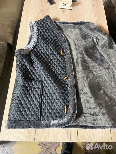 Меховая жилетка