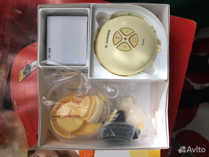 Эл молокоотсос Medela