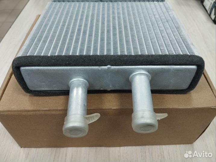 Радиатор отопителя Mazda Demio 1996-2003