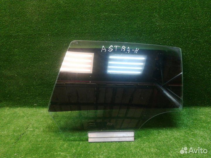 Стекло двери заднее левое Opel Astra H 2004-2010