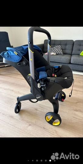 Коляска и автокресло Doona с базой isofix