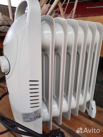 Масляный обогреватель