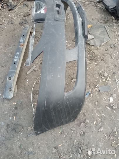 Бампер передний Mitsubishi Lancer 9