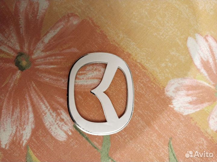 Эмблема на руль mazda