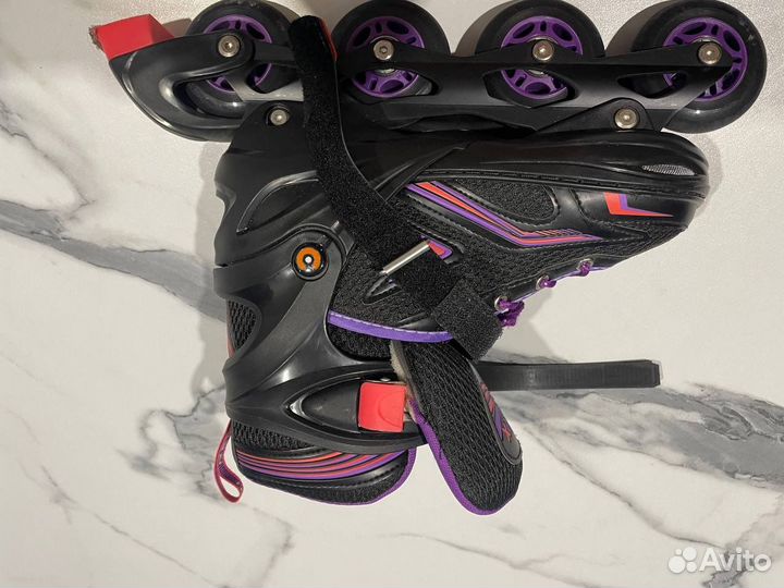 Роликовые коньки