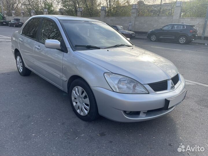 Mitsubishi Lancer 1.6 МТ, 2006, 205 000 км