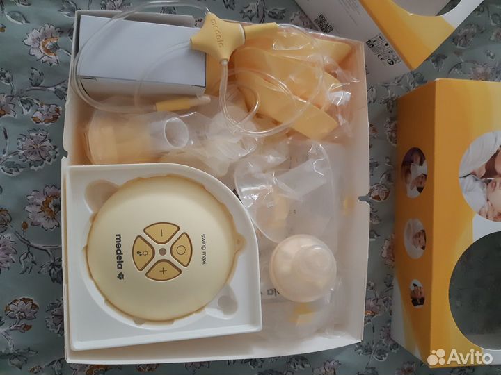 Молокоотсос электрический medela swing maxi