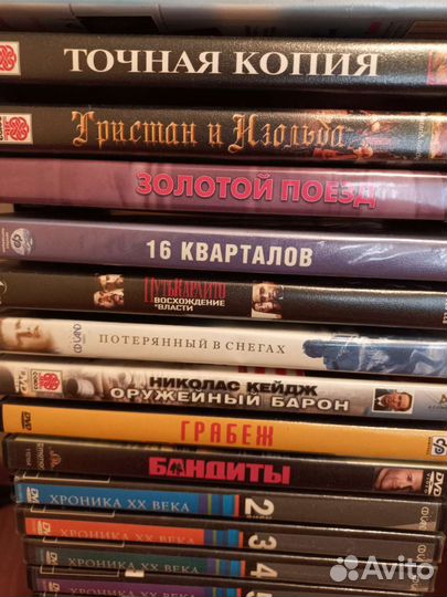 Стойка с DVD дисками в ассортименте