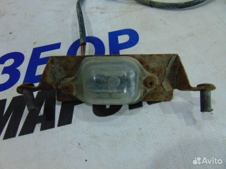 Фонарь подсветки номера для Kia Spectra 2001-2011г