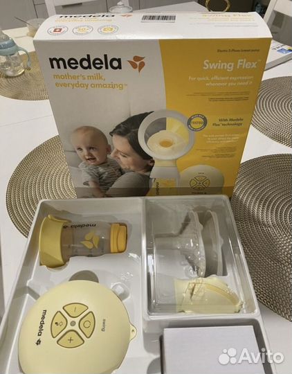 Электрический молокоотсос medela swing flex