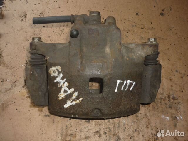 Суппорт передний правый Митцубиси Лансер 9