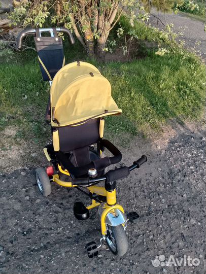 Велосипед-коляска с родительской ручкой