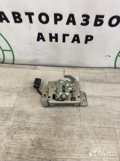 Замок капота Mitsubishi Lancer 10