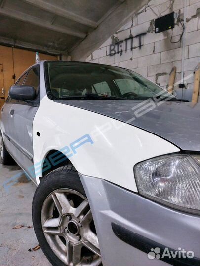 Комплект крыльев Mazda 323 BJ (1998–2000)
