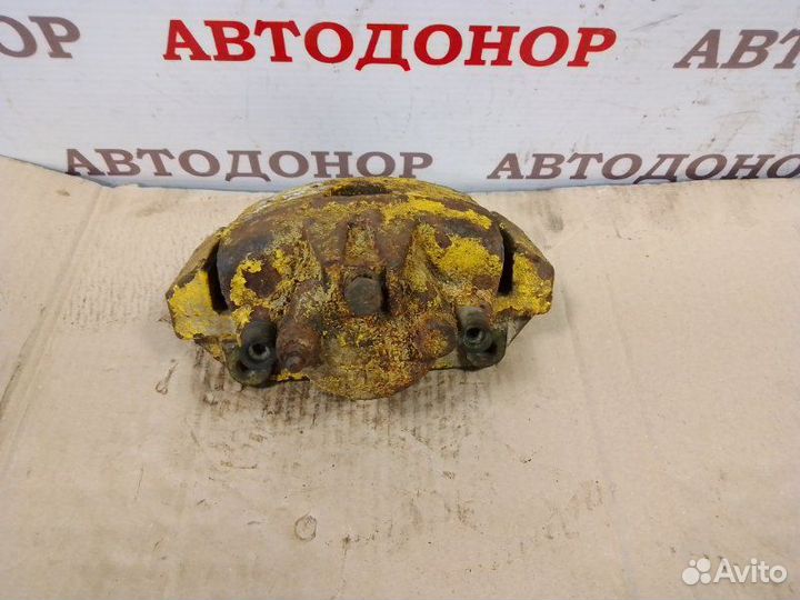 Суппорт тормозной передний левый Dodge Caravan 3.3