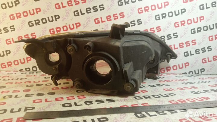 Фара головная DY L не рест б/у (черные очки) Demio