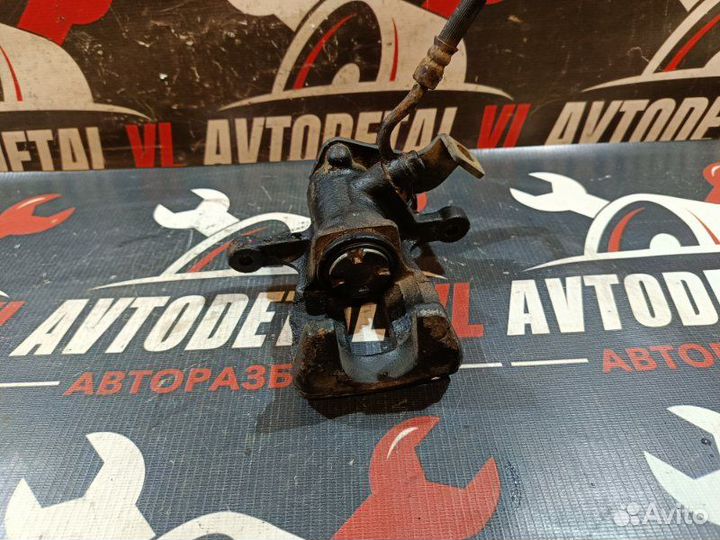 Суппорт тормозной задний левый Hyundai Solaris