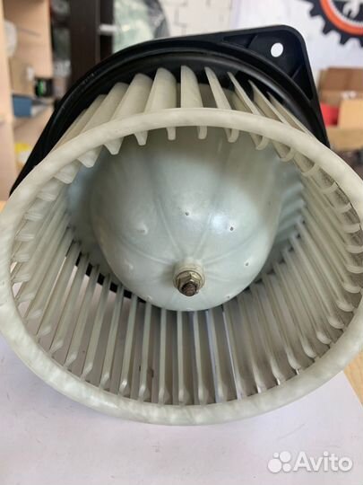 Моторчик отопителя салона Mitsubishi Lancer X