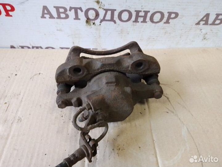 Суппорт тормозной передний правый Volkswagen