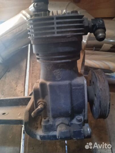 Компрессор на трактор ньюхолонд