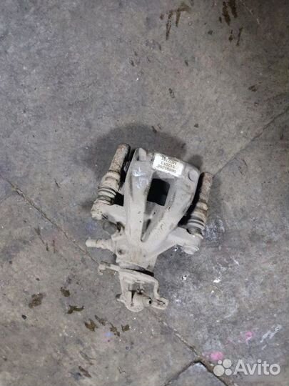 Суппорт тормозной задний правый Geely Emgrand Ec7