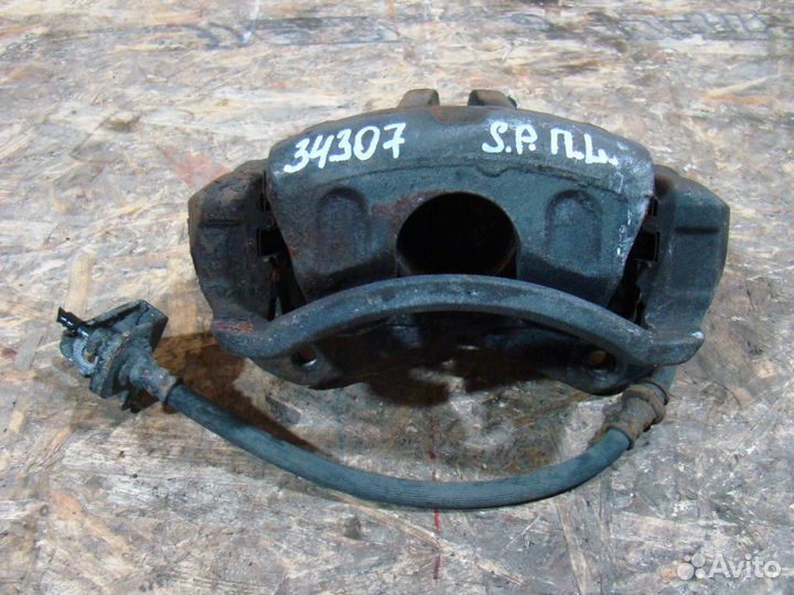 KIA Sportage 2 Суппорт тормозной передний левый