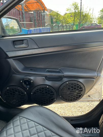 Продам дверные карты на lancer 10