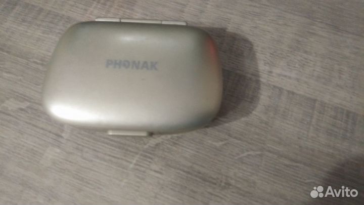 Заушный почти не видимый слуховой аппарат