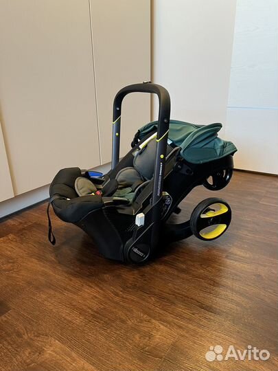 Коляска автокресло doona с базой isofix