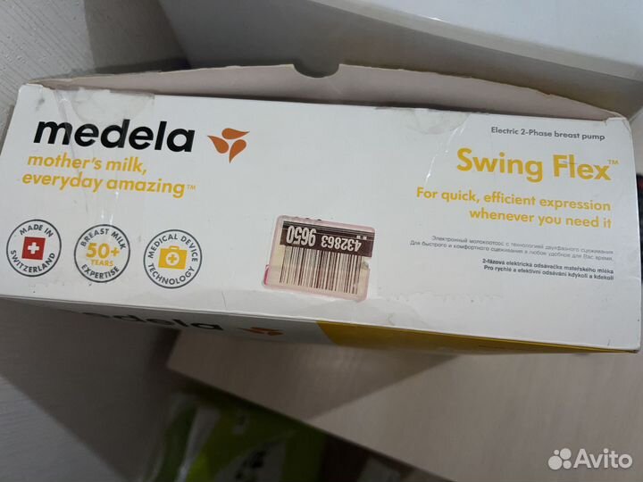 Молокоотсос medela swing flex