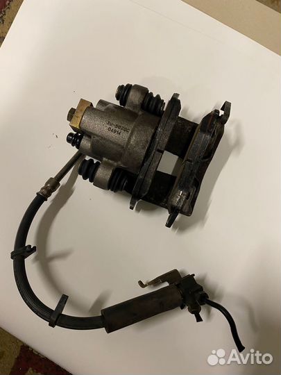 Суппорт задний левый Jeep Grand Cherokee