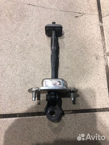 Ограничитель двери передний правый Subaru Impreza