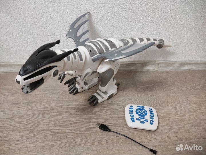 Игрушка Динозавр с пультом